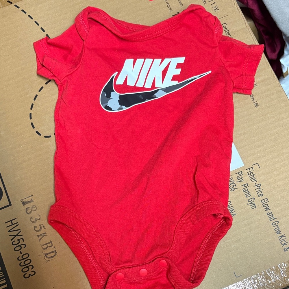 Nike Red baby onesie